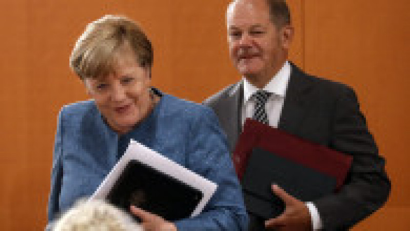 Cancelarul german Angela Merkel și ministrul de finanțe Olaf Scholz sosesc la o ședință a cabinetului federal german Foto: Guliver/GettyImages | Poza 39 din 41