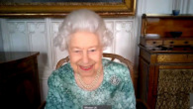 Regina Elisabeta a II-a a avut prima sa apariție publică după scandalul interviului acordat de Meghan Markle și prințul Harry. Suverana a intrat într-o discuție online pentru a marca Săptămâna Britanică a Științei Foto: Profimedia | Poza 40 din 44