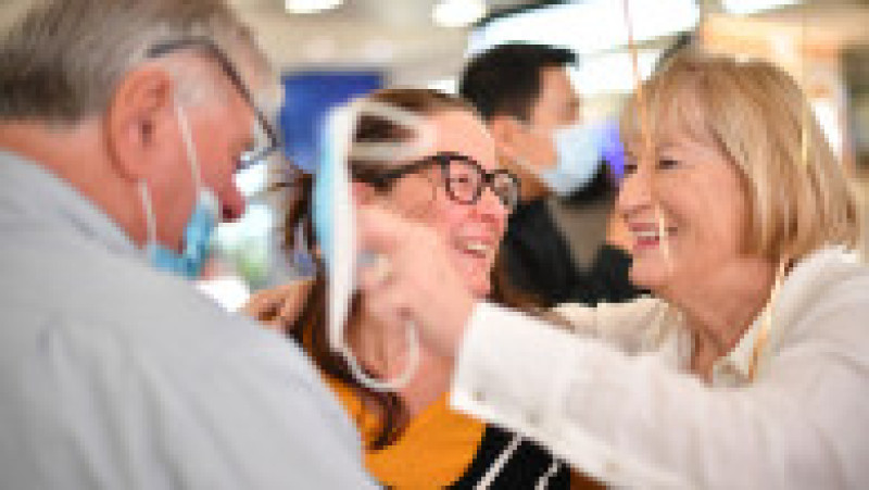 Reunirea unei familii pe aeroportul dn Sydney. Foto: Profimedia Images | Poza 4 din 7