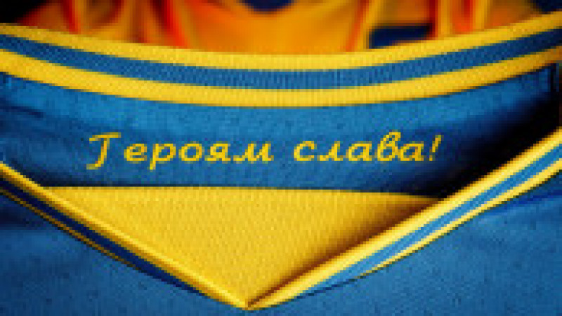 Pe spatele tricoului este inscripționat sloganul patriotic „Slavă Ucrainei!”. Foto: Facebook / Andrei Pavelko | Poza 7 din 10