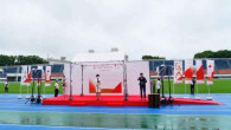 Flacăra olimpică a sosit la Tokyo. Ceremonie discretă și tristă pe un stadion gol și pe o vreme ploioasă. FOTO: Profimedia | Poza 5 din 5