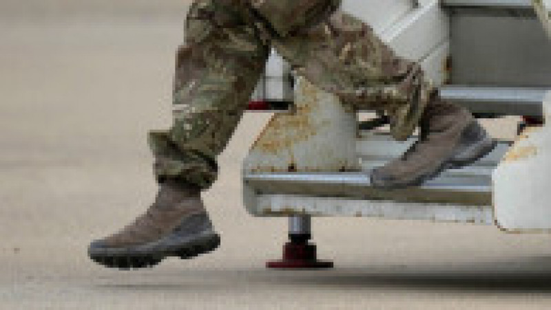 Membri ai forțelor armate britanice care au revenit din Afganistan au aterizat la o bază militară din Oxfordshire. Foto: Profimedia Images | Poza 8 din 8