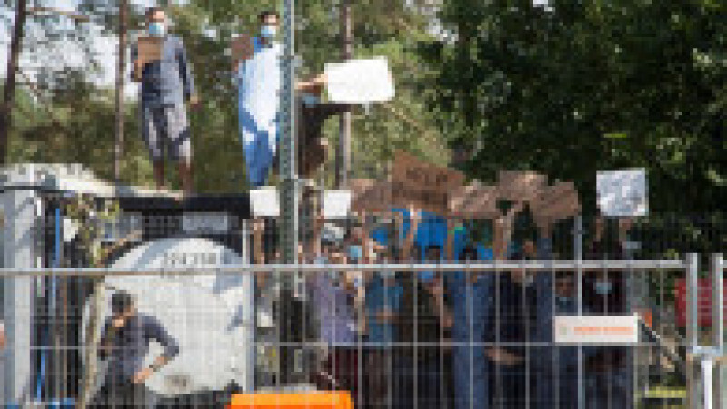 Imigranții din tabăra de la Rudninkai protestează Foto: Profimedia Images | Poza 7 din 8