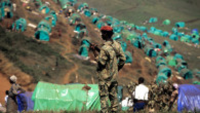 Trupe paramilitare rwandeze asigură ordinea în taberele de refugiați. 1994 Sursa foto: Profimedia Images | Poza 9 din 30