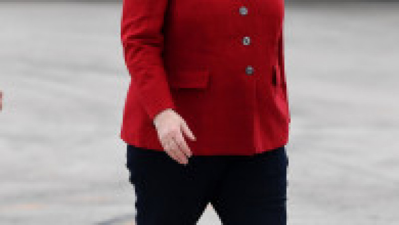 Angela Merkel și-a creat propria uniformă de cancelar: sacoul pătrățos și, de obicei, viu colorat cu pantalon. FOTO: Profimedia Images | Poza 12 din 22