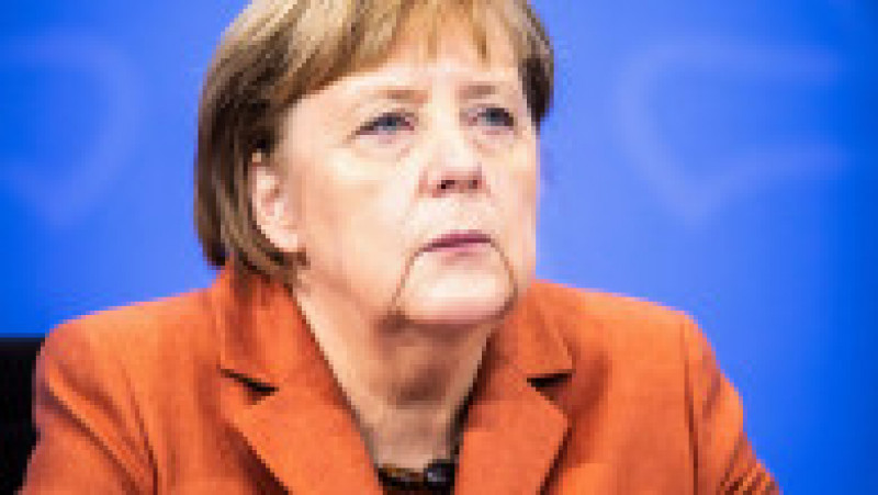 Angela Merkel și-a creat propria uniformă de cancelar: sacoul pătrățos și, de obicei, viu colorat cu pantalon. FOTO: Profimedia Images | Poza 15 din 22