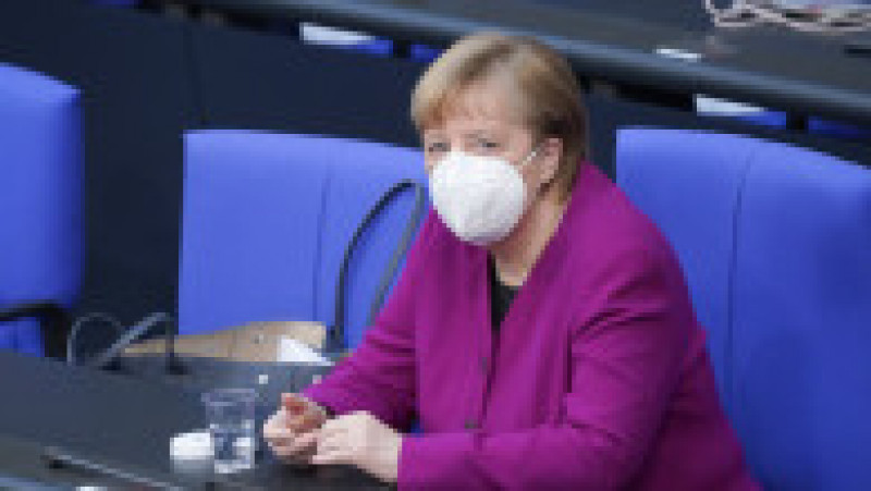 Angela Merkel și-a creat propria uniformă de cancelar: sacoul pătrățos și, de obicei, viu colorat cu pantalon. FOTO: Profimedia Images | Poza 10 din 22