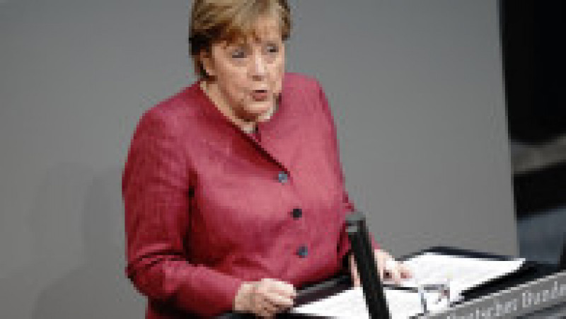 Angela Merkel și-a creat propria uniformă de cancelar: sacoul pătrățos și, de obicei, viu colorat cu pantalon. FOTO: Profimedia Images | Poza 9 din 22