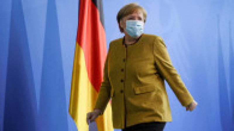 Angela Merkel și-a creat propria uniformă de cancelar: sacoul pătrățos și, de obicei, viu colorat cu pantalon. FOTO: Profimedia Images | Poza 1 din 22