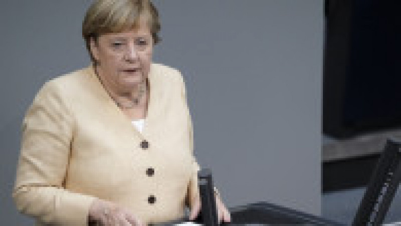 Angela Merkel și-a creat propria uniformă de cancelar: sacoul pătrățos și, de obicei, viu colorat cu pantalon. FOTO: Profimedia Images | Poza 3 din 22