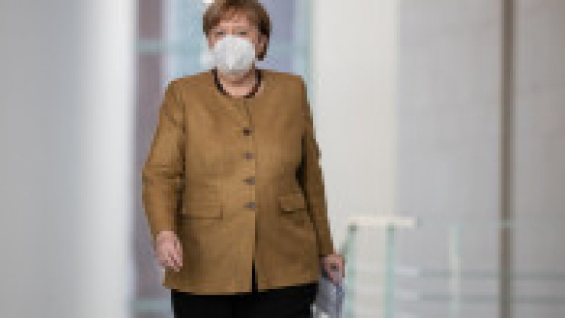 Angela Merkel și-a creat propria uniformă de cancelar: sacoul pătrățos și, de obicei, viu colorat cu pantalon. FOTO: Profimedia Images | Poza 20 din 22