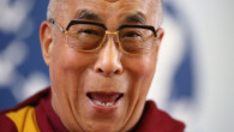 CAMBRIDGE, CAMBRIDGESHIRE - APRIL 19: His Holiness the Dalai Lama laughs during a press conference in the Divinity School of St. John