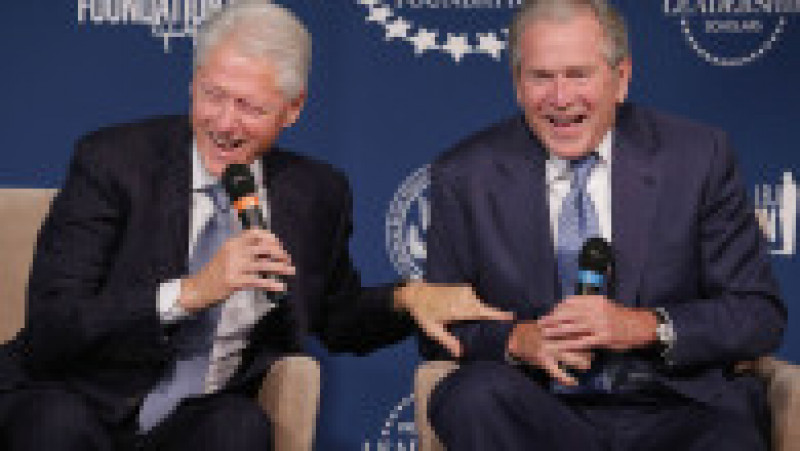 WASHINGTON, DC - SEPTEMBER 08: Former U.S. presidents Bill Clinton (L) and George W. Bush share a laugh during an event launching the Presidential Leadership Scholars program at the Newseum September 8, 2014 in Washington, DC. With the cooperation of the Clinton, Bush, Lyndon B. Johnson and George H. W. Bush presidential libraries and foundations, the new scholarship program will provide 