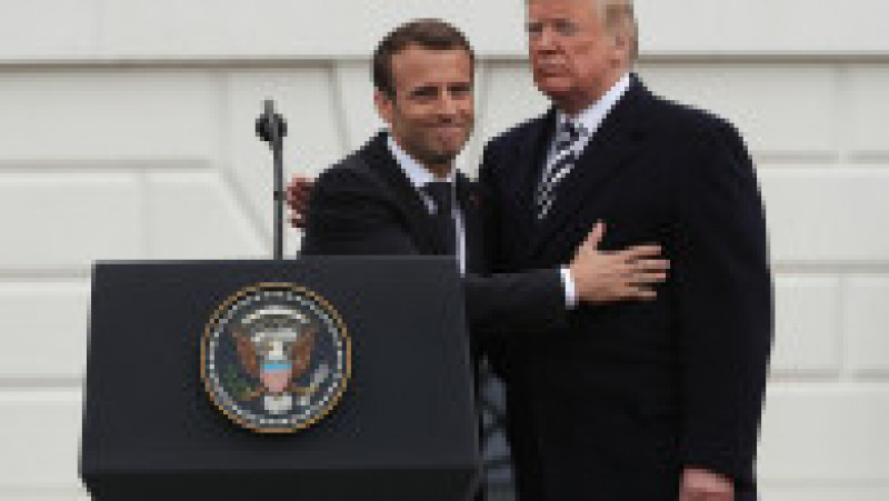 President Donald Trump (R) and French President Emmanuel Macron (L) participate in a state arrival ceremony at the South Lawn of the White House April 24, 2018 in Washington, DC. Trump is hosting Macron for a two-day official visit that includes dinner at George Washington