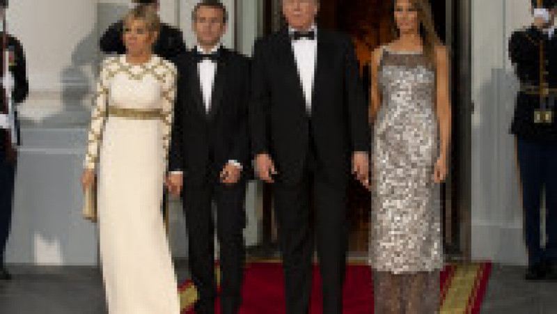WASHINGTON, DC - APRIL 24: U.S President Donald Trump and U.S. first lady Melania Trump stand with French President Emmanuel Macron and French first lady Brigitte Macron after their arrival at the North Portico before a State Dinner at the White House, April 24, 2018 in Washington, DC. Trump is hosting Macron for a two-day official visit that included dinner at George Washington