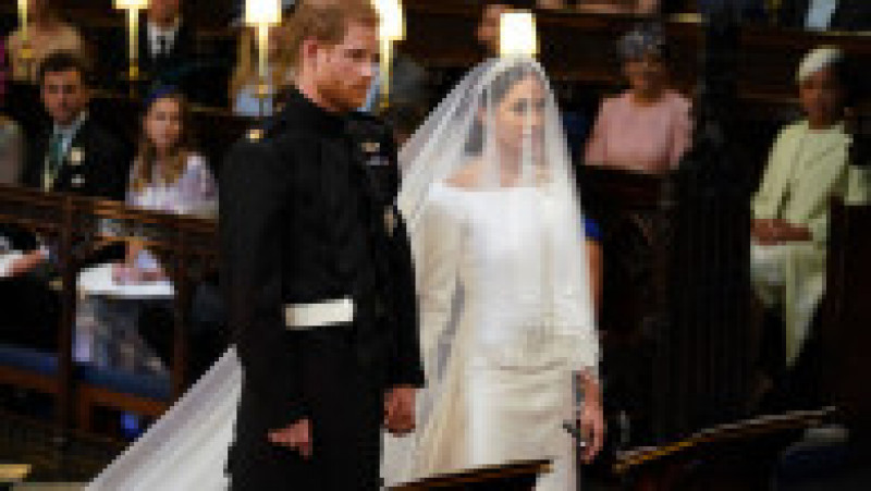 WINDSOR, UNITED KINGDOM - MAY 19: Prince Harry and Meghan Markle stand together in St George