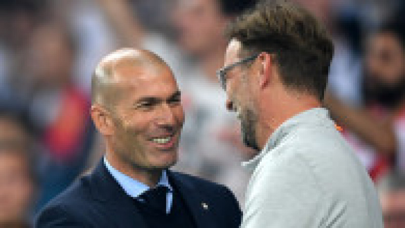 KIEV, UKRAINE - MAY 26: Zinedine Zidane, Manager of Real Madrid greets Jurgen Klopp, Manager of Liverpool prior to the UEFA Champions League Final between Real Madrid and Liverpool at NSC Olimpiyskiy Stadium on May 26, 2018 in Kiev, Ukraine. (Photo by Shaun Botterill/Getty Images) | Poza 5 din 37