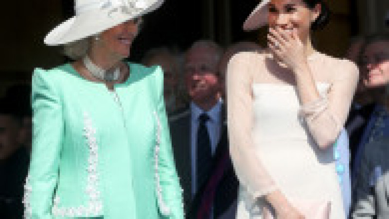 LONDON, ENGLAND - MAY 22: (EDITORS NOTE: Retransmission of #961398570 with alternate crop.) (L-R) Camilla, Duchess of Cornwall and Meghan, Duchess of Sussex attend The Prince of Wales