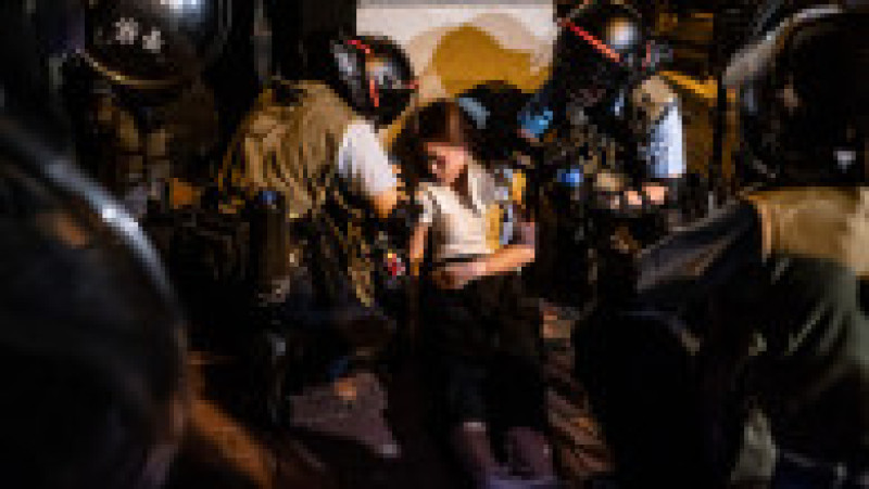 HONG KONG, HONG KONG - JUNE 10: A protester faints during a clash after a rally against the extradition law proposal at the Central Government Complex on June 10, 2019 in Hong Kong China. Over a million protesters marched in Hong Kong on Sunday against a controversial extradition bill that would allow suspected criminals to be sent to mainland China for trial as tensions escalated in recent weeks.(Photo by Anthony Kwan/Getty Images) | Poza 8 din 15