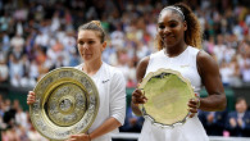 LONDON, ENGLAND - JULY 13: Simona Halep of Romania, winner and Serena Williams of The United States, runner-up pose for a photo with their respective trophies after the Ladies