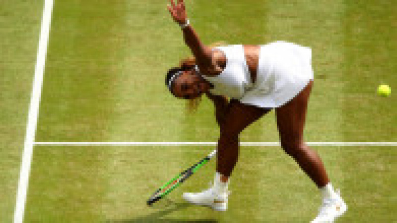 LONDON, ENGLAND - JULY 13: Serena Williams of The United States stretches to play a forehand in her Ladies