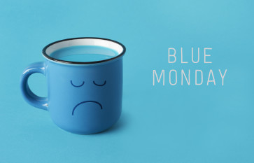 blue mug with sad face and text blue monday