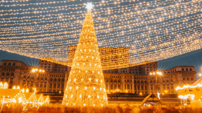People in front of Christmas tree at Bucharest Christmas Market